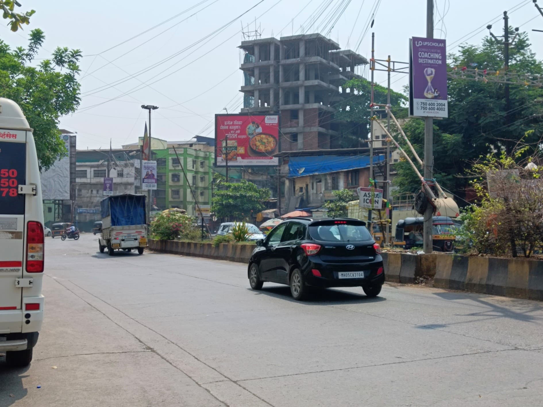 MediaWisse outdoor hoarding at Opposite Wood Mall: MediaWisse-operated board at Opposite Wood Mall (Dombivli) (photo 2)