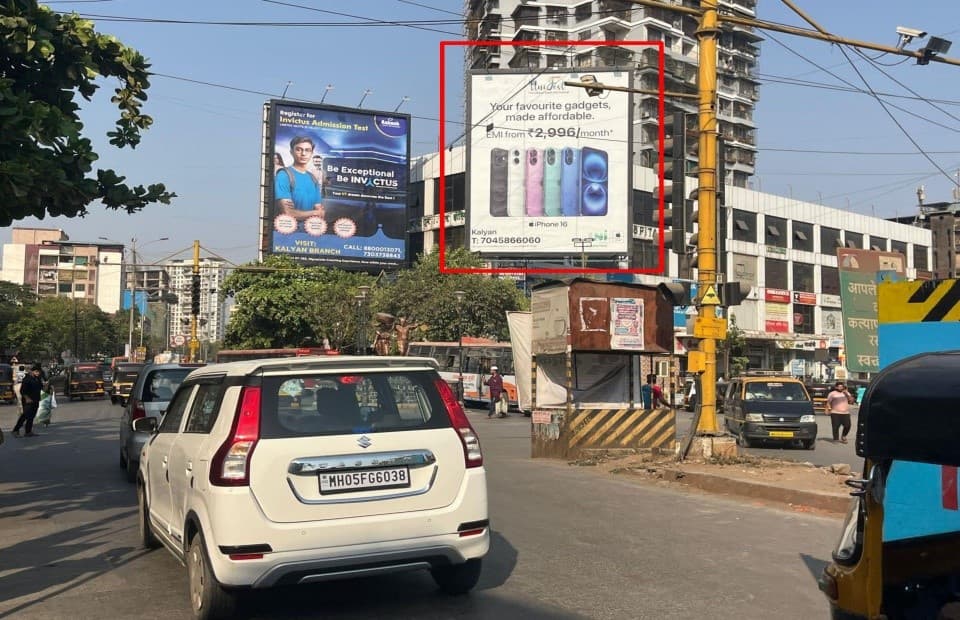 MediaWisse outdoor hoarding at Bail Bazar Circle Dominos Facing Patripul RHS: MediaWisse-operated board at Bail Bazar Circle Dominos in Kalyan, facing Patripul RHS (photo 1)