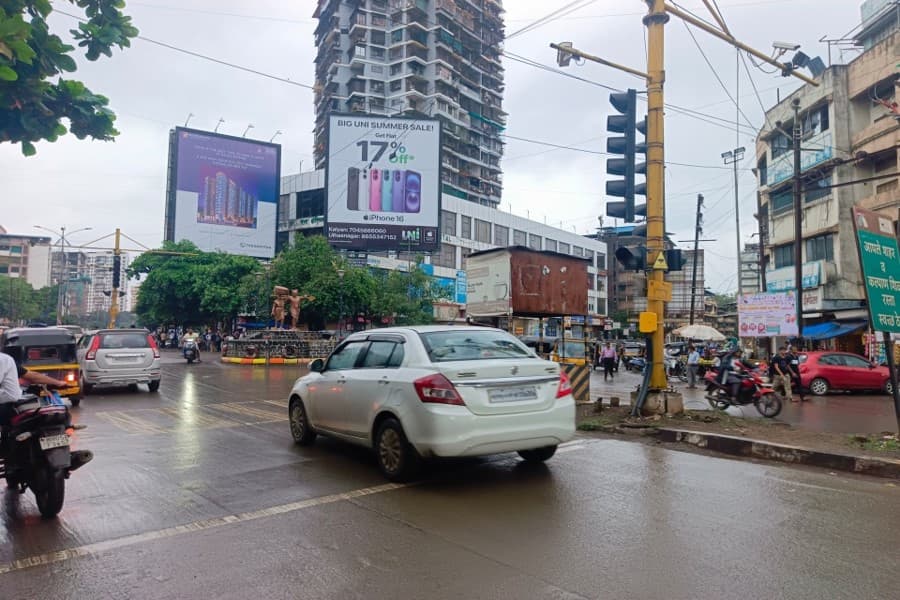 MediaWisse outdoor hoarding at Bail Bazar Circle Dominos Facing Patripul RHS: MediaWisse-operated board at Bail Bazar Circle Dominos in Kalyan, facing Patripul RHS (photo 2)