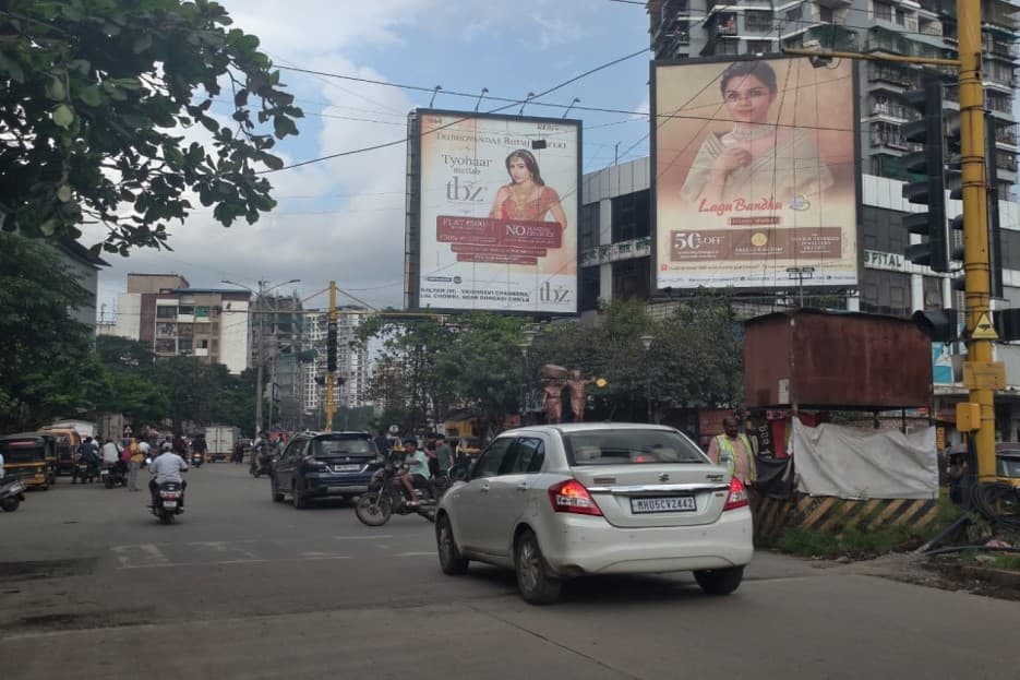 MediaWisse outdoor hoarding at Bail Bazar Circle Dominos Facing Patripul RHS: MediaWisse-operated board at Bail Bazar Circle Dominos in Kalyan, facing Patripul RHS (photo 3)