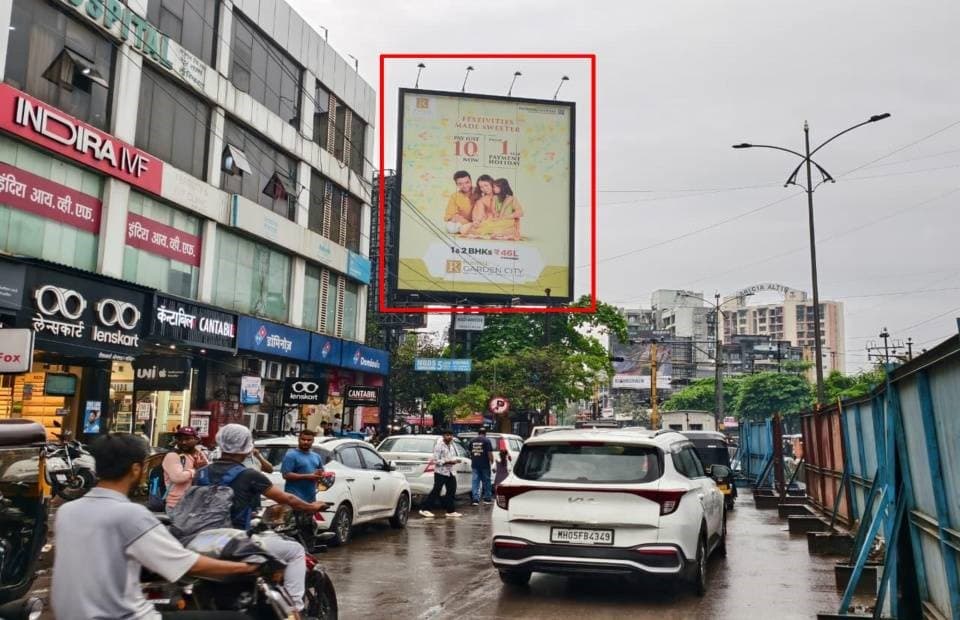 MediaWisse outdoor hoarding at Bail Bazar Circle Dominos Facing Shivaji Chowk: MediaWisse-operated board at Bail Bazar Circle Dominos in Kalyan, facing Shivaji Chowk (photo 1)