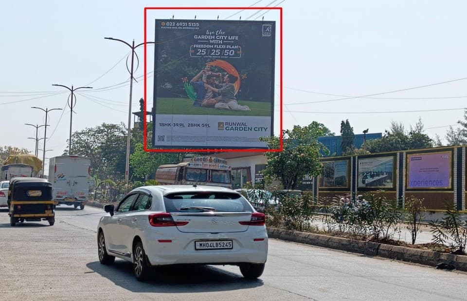 MediaWisse outdoor hoarding at Kalyan Bhiwandi Road - Opposite Mahindra Happinest Project Tata Amantra Gate Facing Bypass Junction: MediaWisse-operated board at Kalyan Bhiwandi Road - Opposite Mahindra Happinest Project Tata Amantra Gate in Kalyan, facing Bypass Junction (photo 1)