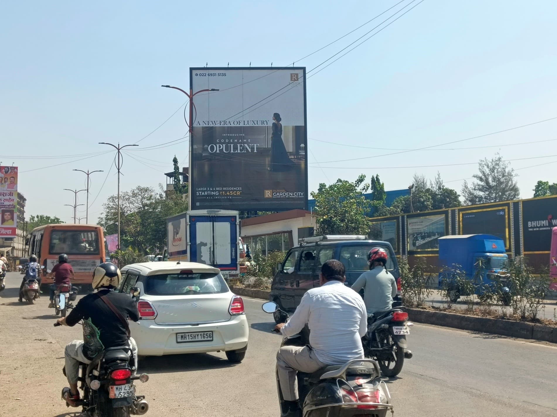 MediaWisse outdoor hoarding at Kalyan Bhiwandi Road - Opposite Mahindra Happinest Project Tata Amantra Gate Facing Bypass Junction: MediaWisse-operated board at Kalyan Bhiwandi Road - Opposite Mahindra Happinest Project Tata Amantra Gate in Kalyan, facing Bypass Junction (photo 3)