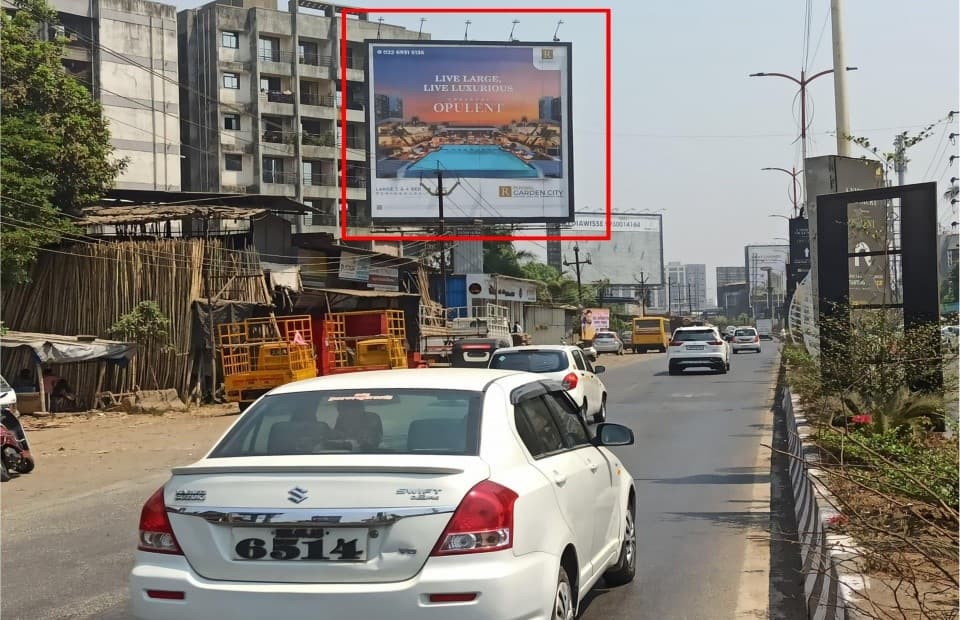 MediaWisse outdoor hoarding at Katai Naka Facing Vashi: MediaWisse-operated board at Katai Naka in Kalyan-Shil Road, facing Vashi (photo 1)