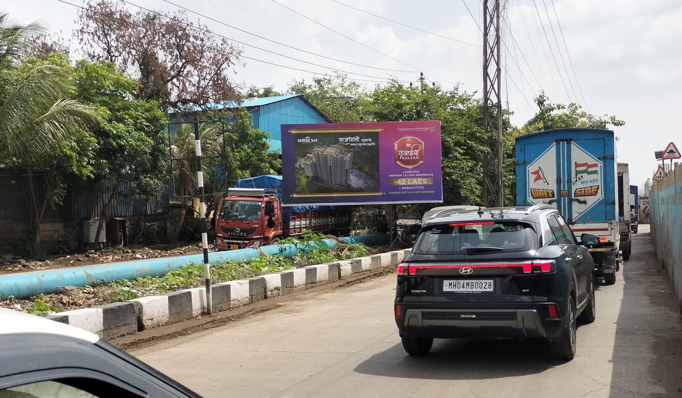 MediaWisse outdoor hoarding at Opposite Classik Hotel Facing Vashi Towards Kalyan - Location 3: MediaWisse-operated board at Opposite Classik Hotel in Kalyan-Shil Road, facing Vashi Towards Kalyan - Location 3 (photo 1)