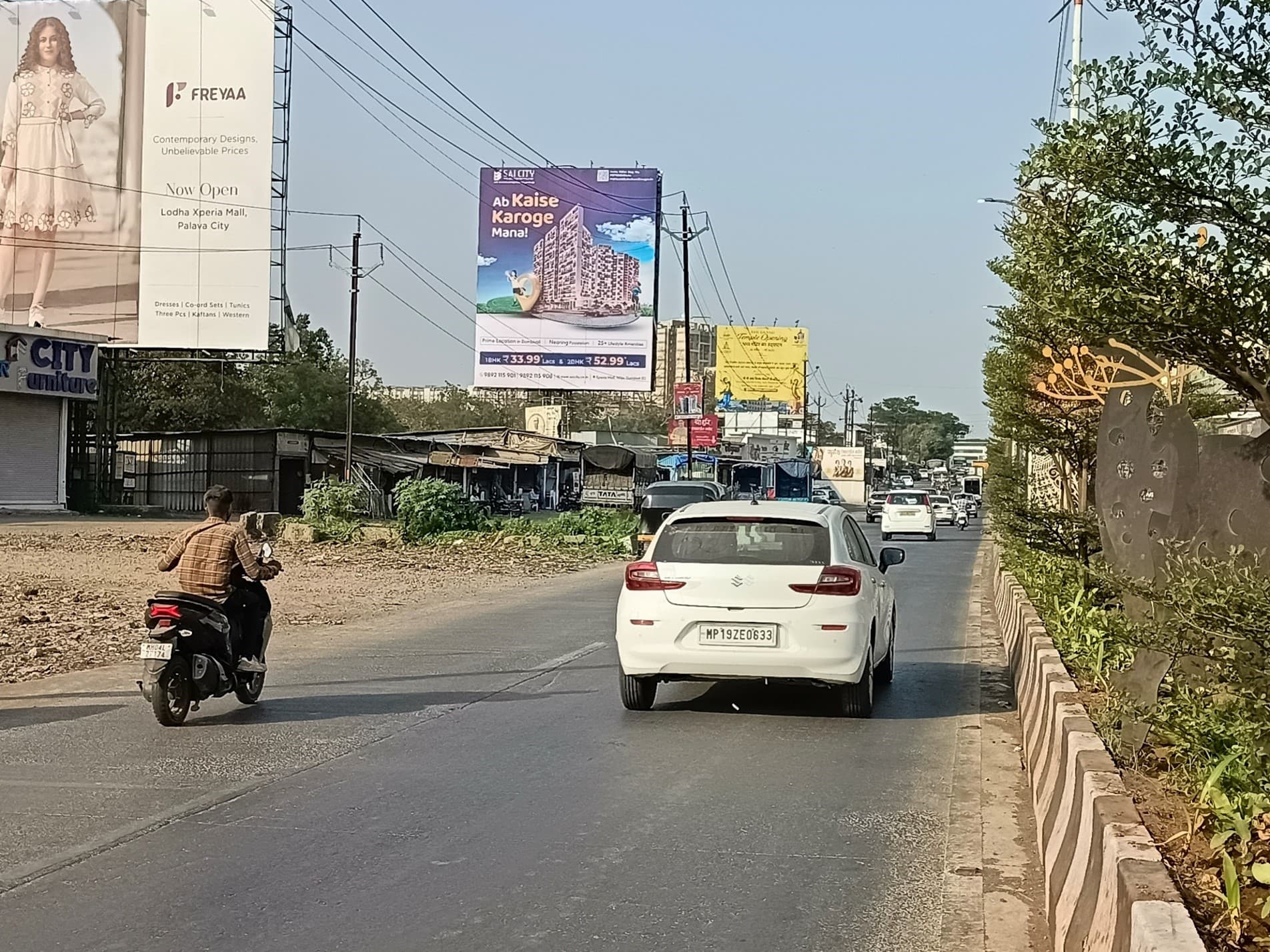 MediaWisse outdoor hoarding at Opposite Croma / Adidas Showroom Facing Vashi: MediaWisse-operated board at Opposite Croma / Adidas Showroom in Kalyan-Shil Road, facing Vashi (photo 2)