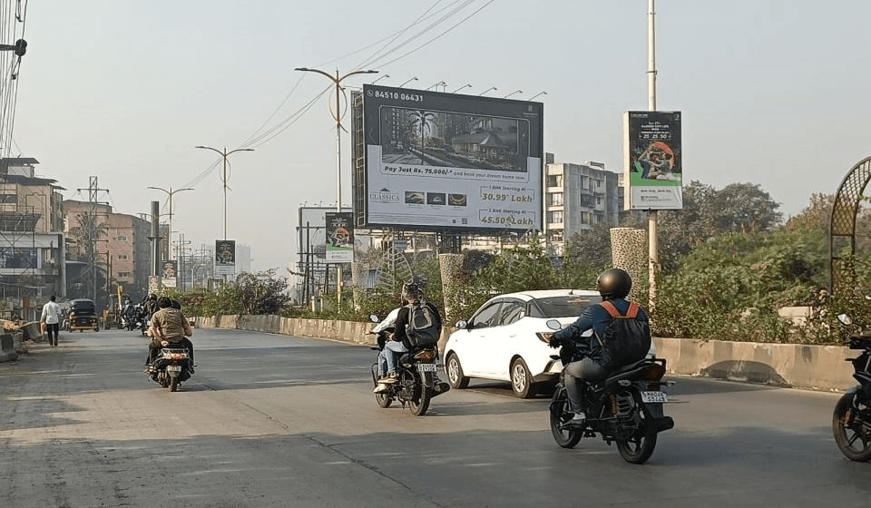 MediaWisse outdoor hoarding at Opposite HP Petrol Pump, Near Katai Naka Facing Kalyan: MediaWisse-operated board at Opposite HP Petrol Pump, Near Katai Naka in Kalyan-Shil Road, facing Kalyan (photo 2)