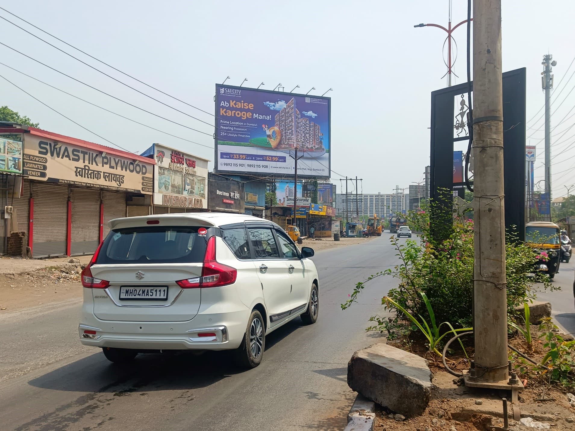 MediaWisse outdoor hoarding at Opposite HP Petrol Pump, Near Katai Naka Facing Vashi: MediaWisse-operated board at Opposite HP Petrol Pump, Near Katai Naka in Kalyan-Shil Road, facing Vashi (photo 3)